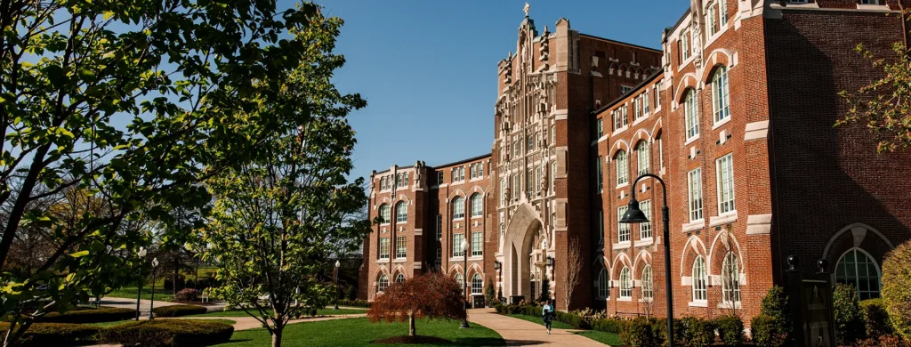 Harkins hall in summertime under a blue sky